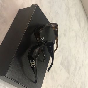 Two Authentic Chanel Sunglasses.